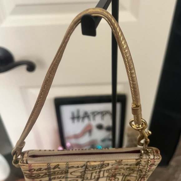 Coach - wristlet in vintage print. GUC. - Picture 4 of 10